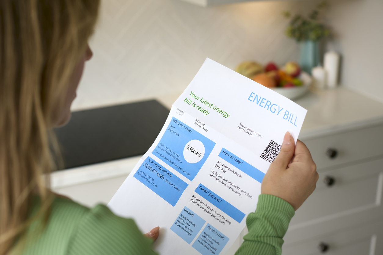 Columbus resident reviewing AEP Ohio electricity bill